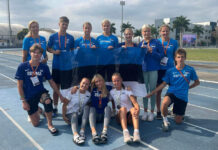 Kambja valla õpilane osales tulemusikult Brasiilias gümnasiaadil Rahvusvärvides meeskond Eesti lipuga staadionil.